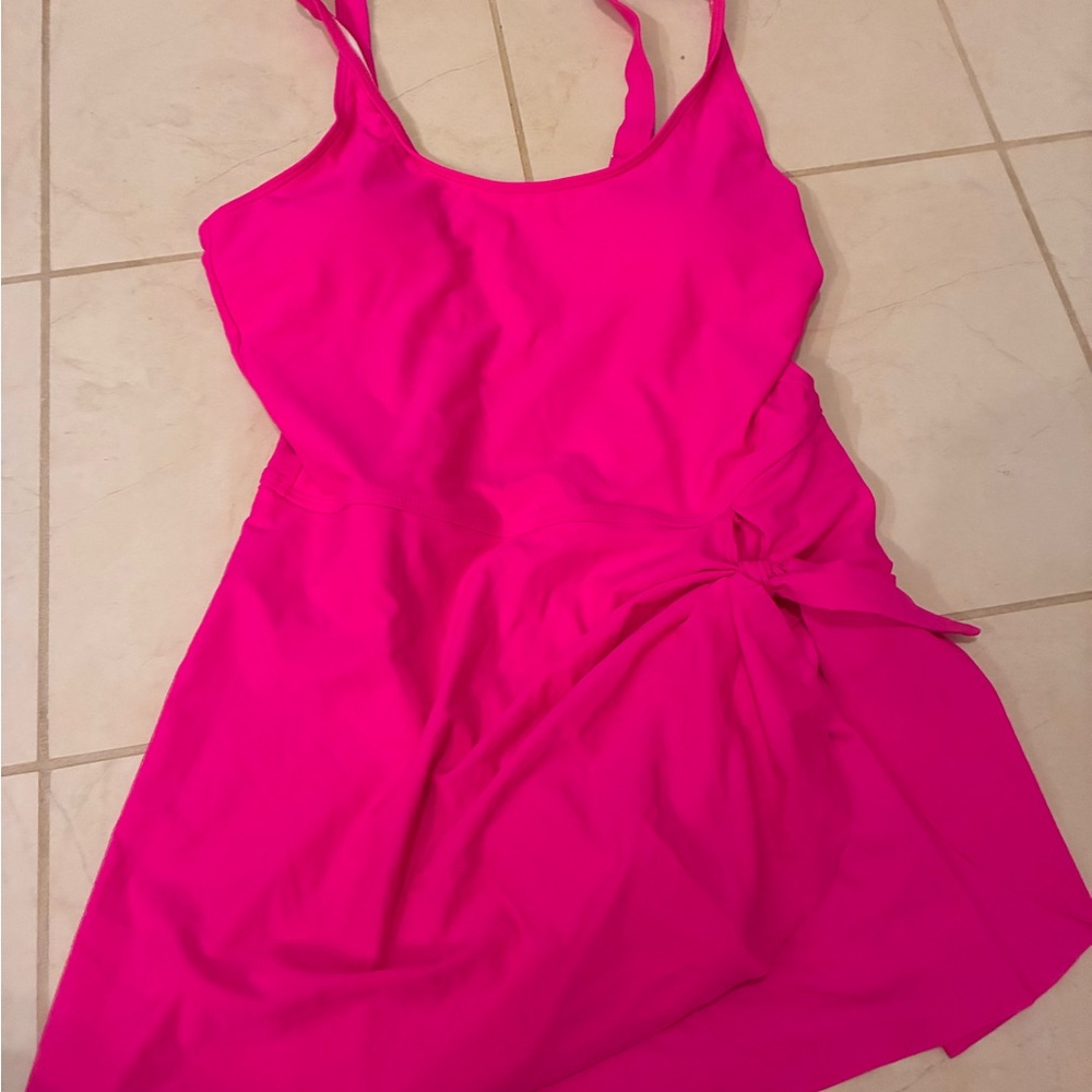 Vibrant Pink Sleeveless Dress and Navy Blue one -piece swimsuit